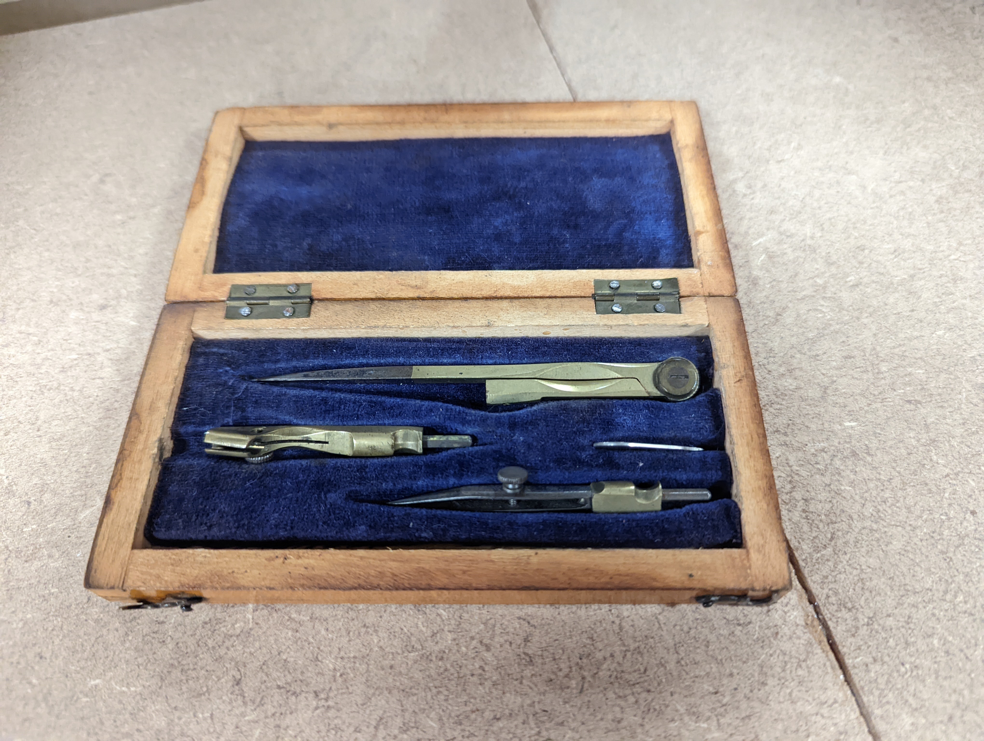 A collection of mahogany cased drawing instruments (8)